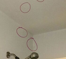 q how does one clean the spots on bathroom ceiling