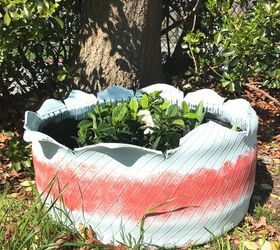 s 8 best ways to brighten up your garden this year, Tire Turned Planter