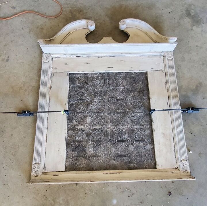 antique style mirror turned faux fireplace mantle
