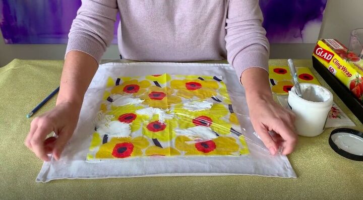 create a diy decorative pillow using napkins and glue, Add Another Layer of Plastic Wrap