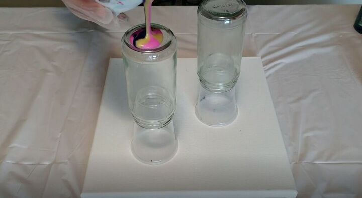 upcycle old jars with this acrylic pour candle project, Pour the Paint