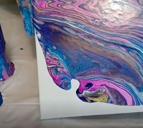 upcycle old jars with this acrylic pour candle project, Tilt the Canvas