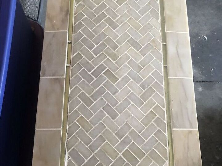 q how to fix tiles that are popping up on a wooden dresser top
