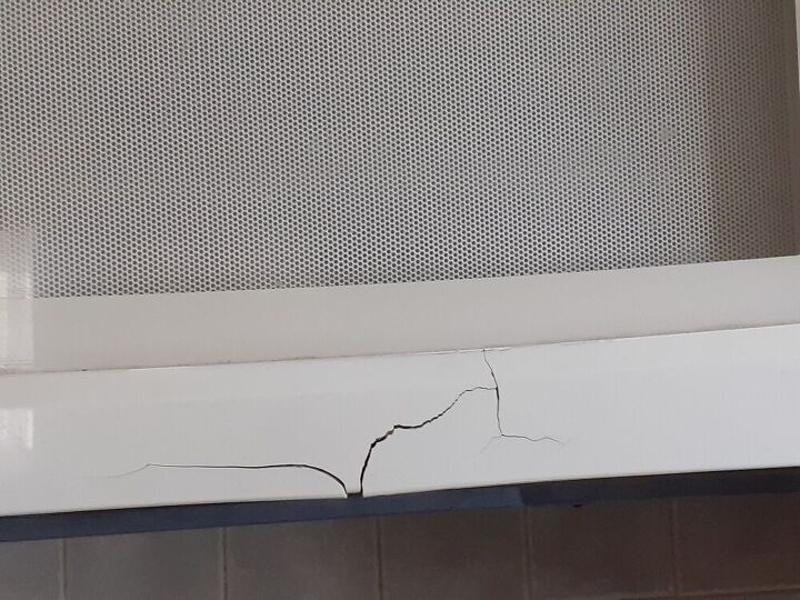 q how to cover this crack on my over the range microwave door