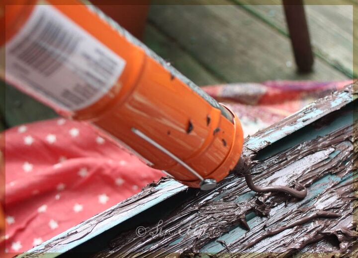 realistic bark texture with caulk and a fork easy flower box makeover