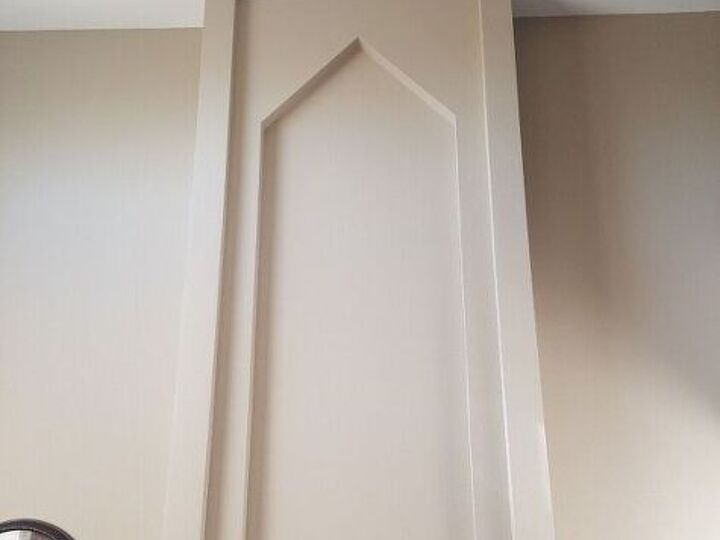 q looking for art for very tall wall above mantle
