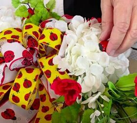 brighten up your front door with this diy ladybug wreath, Glue on Flowers