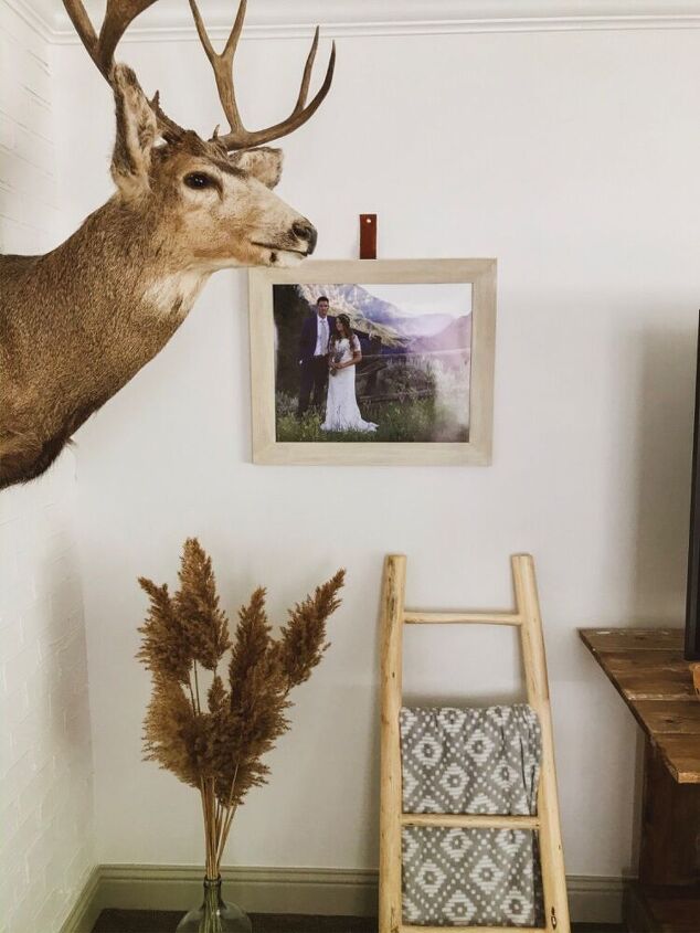 faux leather hanging straps for a gallery wall