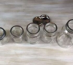 She took the centers out of 5 mason jar lids to make her counter more beautiful