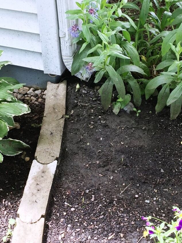 How to Redirect Rainwater From a Downspout