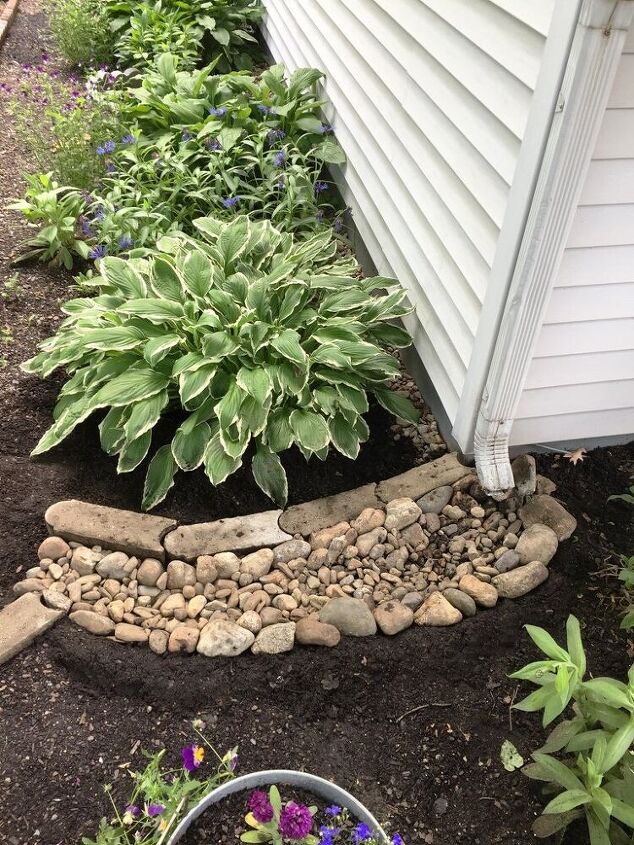 How to Redirect Rainwater From a Downspout
