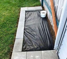 How to Redirect Rainwater From a Downspout