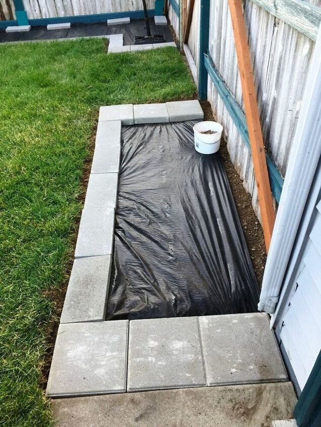 How to Redirect Rainwater From a Downspout