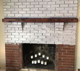 whitewash painted brick fireplace