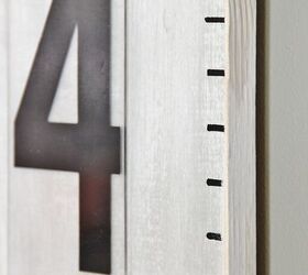 10 farmhouse art wall decor ideas on a budget, Growth Chart With Vintage Marquee Numbers