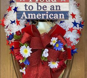 s 16 awesome ways to decorate for july 4th, Patriotic Red Bow Wreath