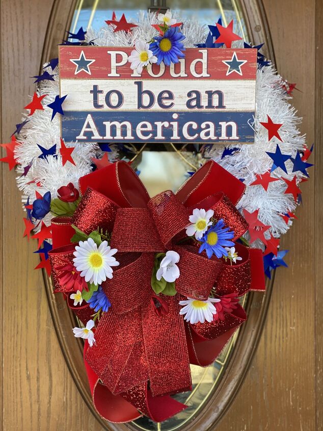 s 16 awesome ways to decorate for july 4th, Patriotic Red Bow Wreath