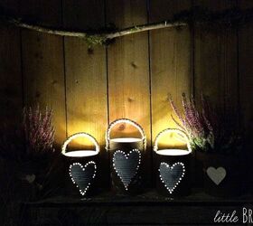 add some outdoor ambiance with these 10 beautiful lighting ideas, Rusty Tin Can Lanterns