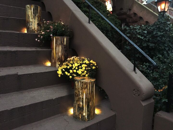 add some outdoor ambiance with these 10 beautiful lighting ideas, Light Up Logs