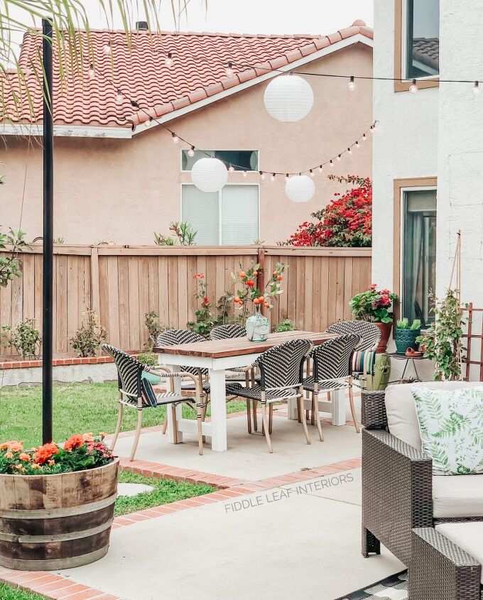 add some outdoor ambiance with these 10 beautiful lighting ideas, Wine Barrel Market Light Posts