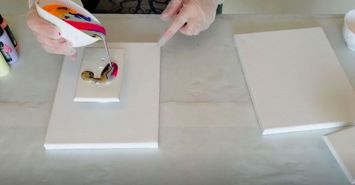 update your light switch plates with this simple paint pour project, Pour the Paint