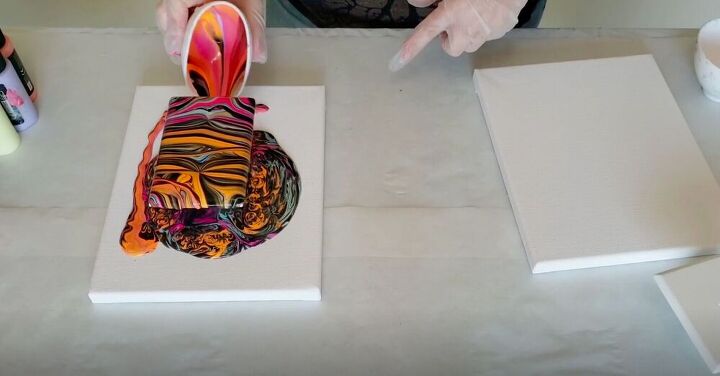 update your light switch plates with this simple paint pour project, Pour onto Canvas