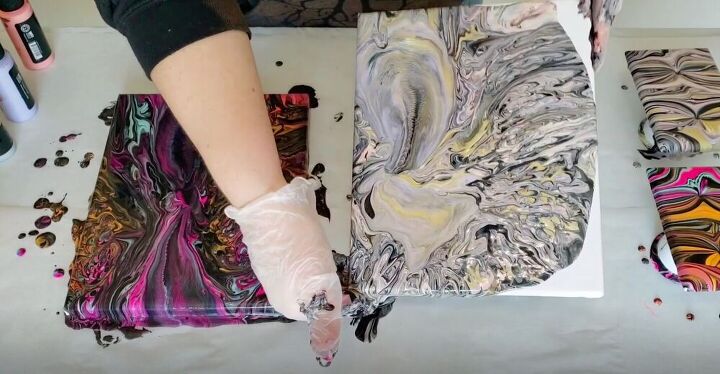 update your light switch plates with this simple paint pour project, Tilt Off Excess Paint