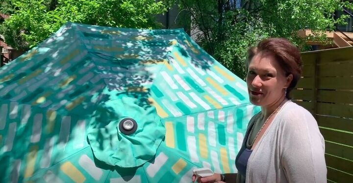 revamp an old patio umbrella with this diy painted umbrella makeover