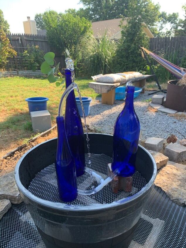 water fountain from wine bottles