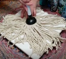 The crazy cool way she uses a mop to make eye-catching decor