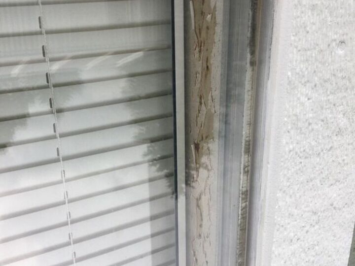 q how do i repair peeling wallpaper between my mobile home windows