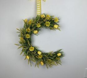 s 12 summer wreaths that will make your front door look so cute, Golden Tulip Half Moon Wreath