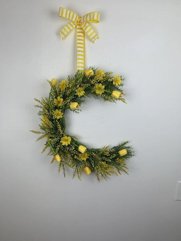s 12 summer wreaths that will make your front door look so cute, Golden Tulip Half Moon Wreath