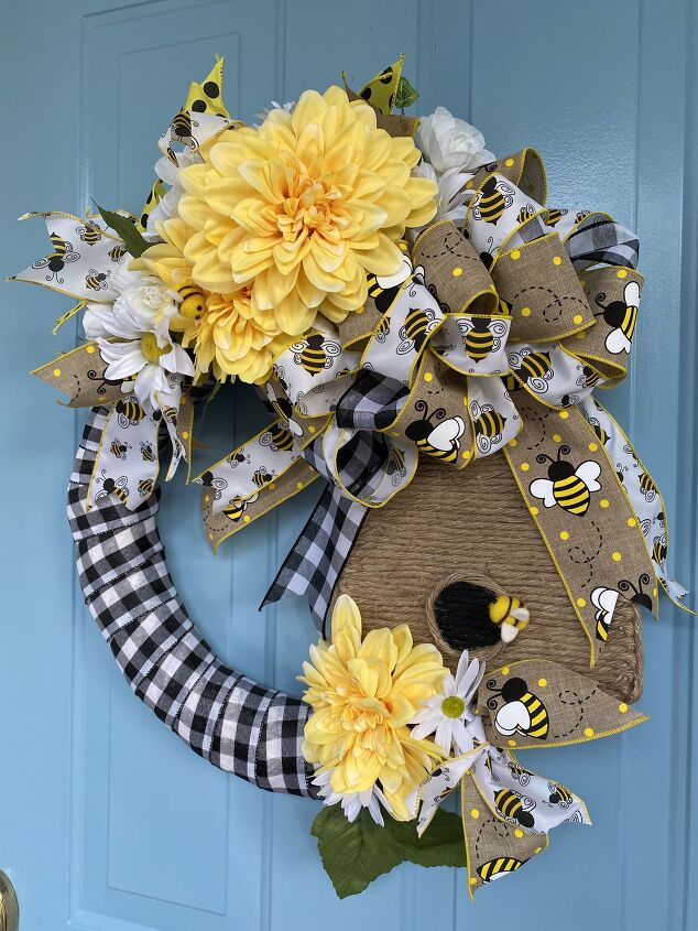 s 12 summer wreaths that will make your front door look so cute, Bee Skep Wreath