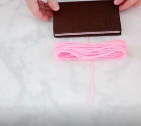 how to make yarn tassels, Slip the Yarn Off