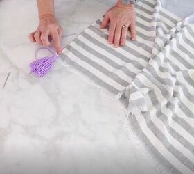 how to make yarn tassels, Tie the Tassel
