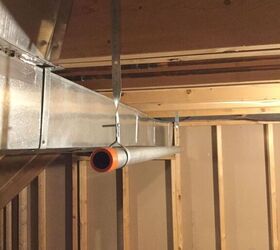 How should I fasten pieces of wood to the joists to hang pullup bar?