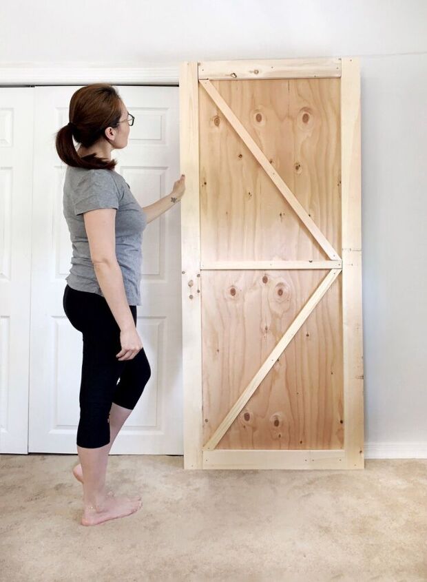 diy budget friendly barn door closet plywood