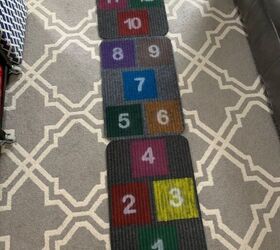 s 9 fun diys that ll keep the kids active during summer vacation, Use cheap rugs to make an indoor hopscotch game