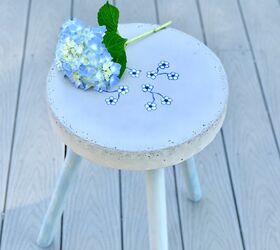 s 14 beautiful pieces of furniture you can make for 50 or much less, Outdoor DIY Concrete Side Table With Flowers