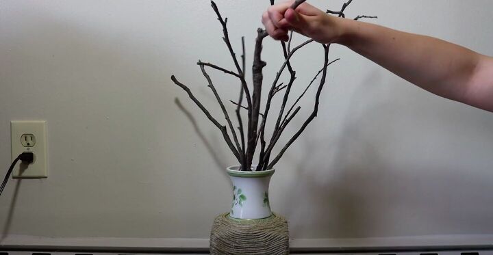 create a diy cat tree with upcycled items, Add Sticks