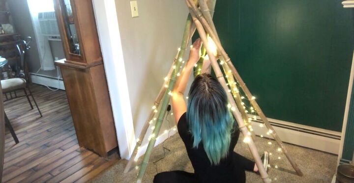 string together a diy teepee tent with twinkle lights, Continue Wrapping Twinkle Lights