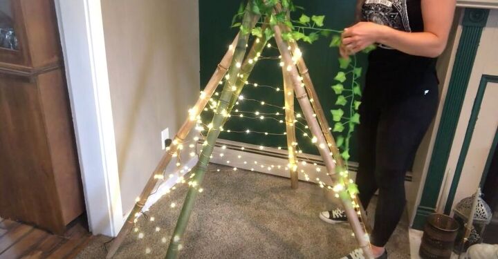 string together a diy teepee tent with twinkle lights, Add Vines