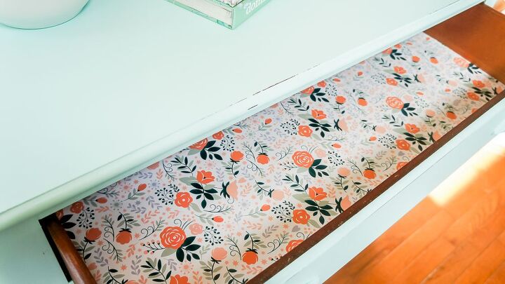 s give your old furniture a stylish upgrade with these 10 ideas, Place pretty wrapping paper inside your drawers