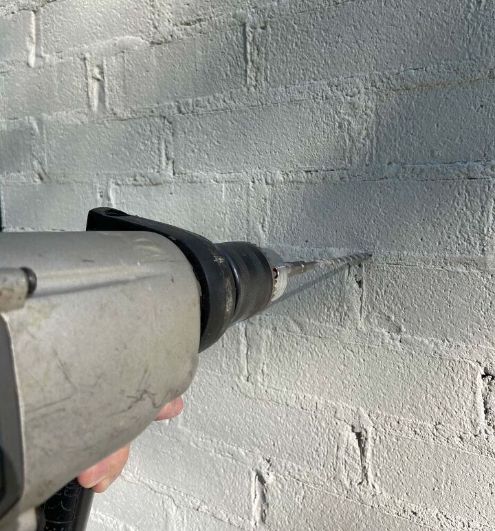 how to mount a tv on a brick wall
