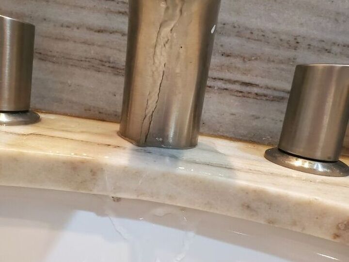 q how do i keel water from going down back of faucet
