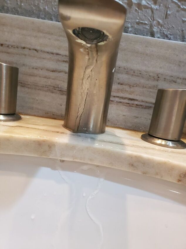 q how do i keel water from going down back of faucet