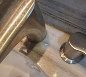 q how do i keel water from going down back of faucet