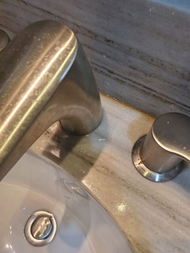 q how do i keel water from going down back of faucet