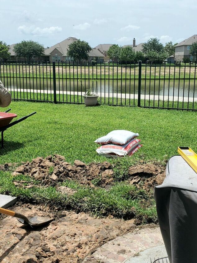how to make a grill landing pad - remove the grass & grade the area